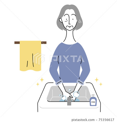 Senior woman washing hands in the washbasin 75356617