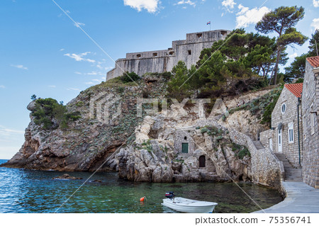 The fortress Bokar and the South-western part of Dubrovnik City walls. Croatia. The fortress Bokar and the South-western part of Dubrovnik City walls. Croatia. 75356741
