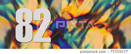 Number 82 on the holographic foil background.  75359377