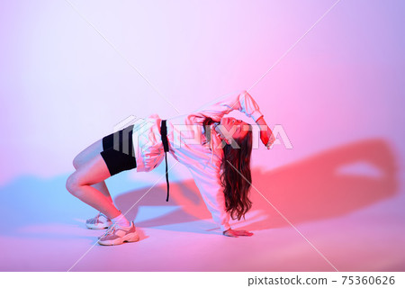 Teenage female dancing hip-hop in studio, casual clothes 75360626