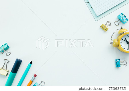 Paper clips, clock, pen, pencil on white background. Work and education concept 75362785