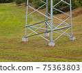 Lower part of a large electric support on a nature background 75363803