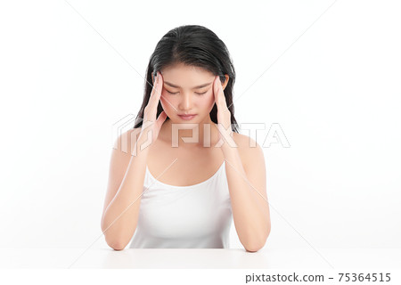 Young asian woman has headache, on white background, Health concept. Young asian woman has headache, on white background, Health concept. 75364515