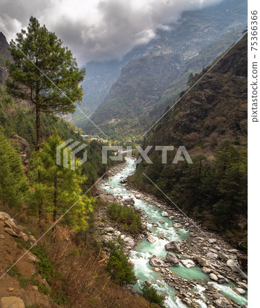 Beautiful mountain river in Himalayas, Everest region, Nepal. Beautiful mountain river in Himalayas, Everest region, Nepal. 75366366