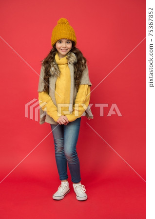 stylish child in knitwear care health in cold season, casual 75367852