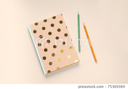 flat lay orange stationery 75369364
