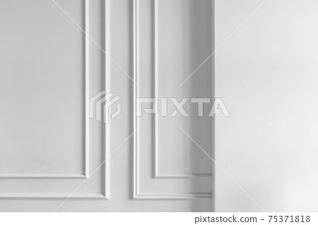 White wall with niche and decorative frame elements White wall with niche and decorative frame elements 75371818