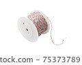 Colorful bobbin thread isolated on white 75373789