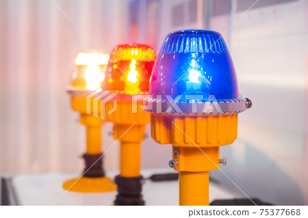 Close up of alarm lamp signal warning flashing lights for industrial machinery Close up of alarm lamp signal warning flashing lights for industrial machinery 75377668