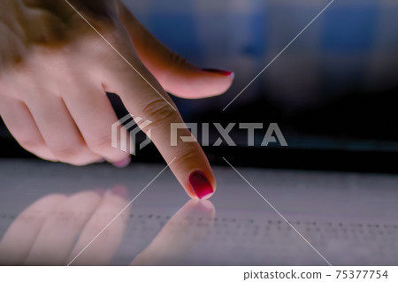 Woman finger using multimedia touchscreen display of interactive kiosk: close up Woman finger using multimedia touchscreen display of interactive kiosk: close up 75377754