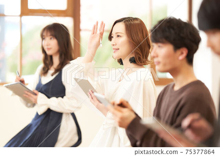 Seminar students raising their hands Seminar students raising their hands 75377864