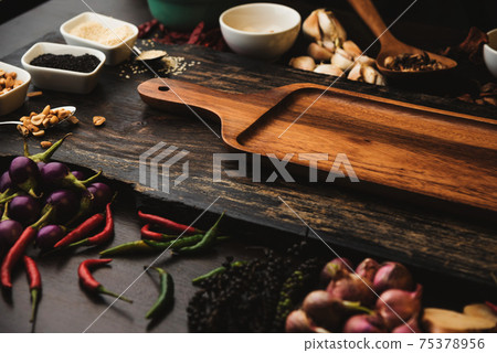 Healthy food herbs Spices for use as cooking ingredients on a wooden background with Fresh organic vegetables on wood. High dietary fibre health smart food concept. Healthy food herbs Spices for use as cooking ingredients on a wooden background with Fresh organic vegetables on wood. High dietary fibre health smart food concept. 75378956