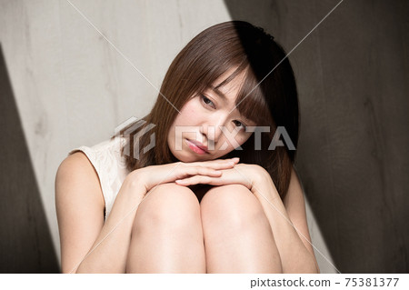 Depressed woman Depressed woman 75381377