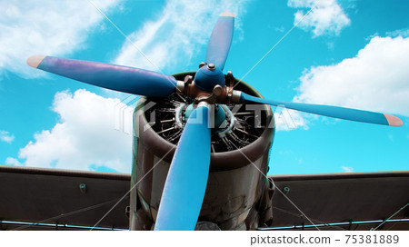 Airplane engine blades on a blue background. 75381889
