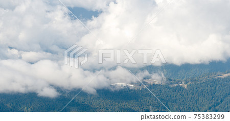 Clouds over mountains 75383299