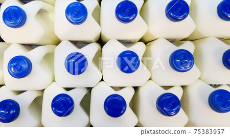 Bottles with milk 75383957