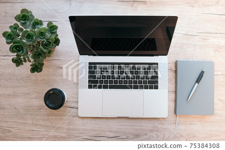 top view. open laptop on the table. top view. open laptop on the table. 75384308