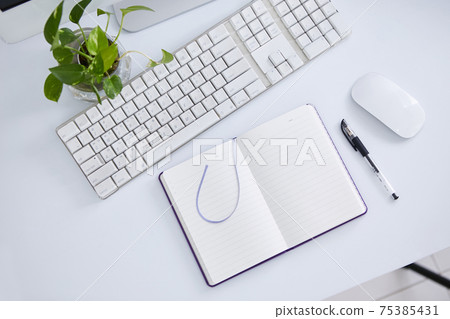 Small items on the desk 75385431