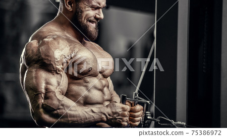 fitness beautiful caucasian woman gym work out back Bent-over rows exercises in gym pumping up muscles workout fitness and bodybuilding concept naked torso 75386972