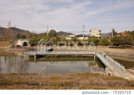 Public park "Green Hills" in Tsuyama City: Artificial pond and bridge Public park "Green Hills" in Tsuyama City: Artificial pond and bridge 75395719