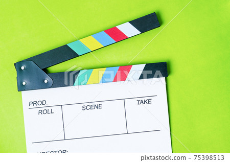 Clapperboard on green background Clapperboard on green background 75398513