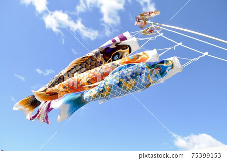 Carp streamer fluttering in the blue sky 75399153