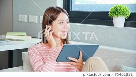 girl listen music at home 75401851
