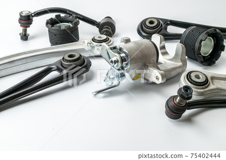 Spark plugs. Auto motor mechanic spare or automotive piece on white background. Set of new metal car part. Repair and vehicle service. 75402444