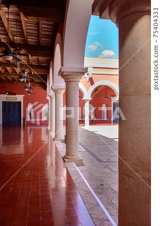 A row of columns in a mexican hacienda. A row of columns in a mexican hacienda. 75404333