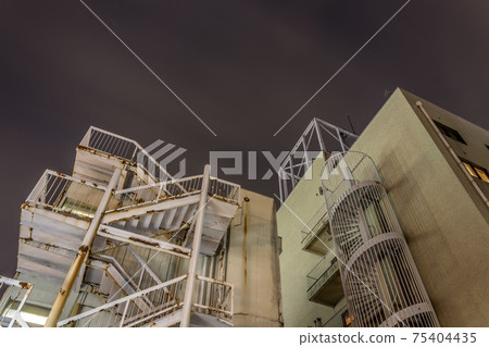 Night view of apartment building, Kanazawa, Japan. Night view of apartment building, Kanazawa, Japan. 75404435
