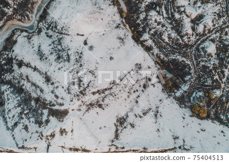 White mountains from phosphorus and gypsum wastes, industrial wastes formed mountains, business activity in Ukraine. 75404513