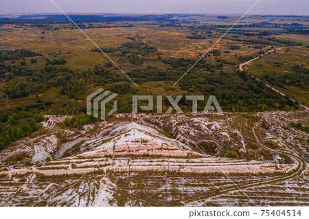 Phosphate gypsum waste from factories, creating artificial white mountains, attractive tourist view. 75404514