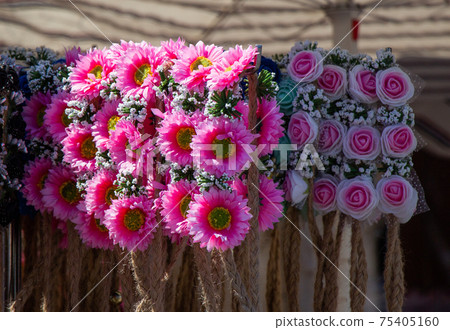 colorful crowns for sale made of fake flowers 75405160