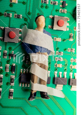 Tiny figurine of man model wrapped in bandages Tiny figurine of man model wrapped in bandages 75405357