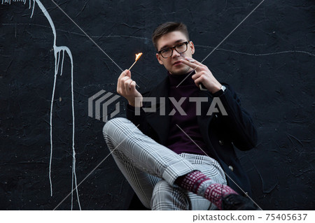 White european young man on black White european young man on black 75405637