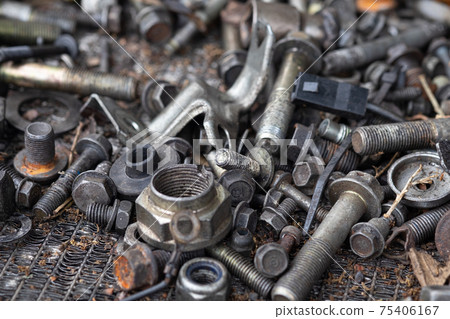 Close up view of rusty auto spare part scrap material. 75406167