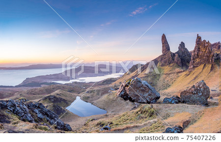 Beautiful and unique Old man of Storr rock in Isle of Skye, Scotland. Early spring Beautiful and unique Old man of Storr rock in Isle of Skye, Scotland. Early spring 75407226