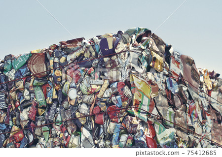 A collection of crushed cans for recycling 75412685