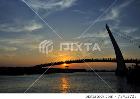 Port pier and bridge at dusk sunset 75412725