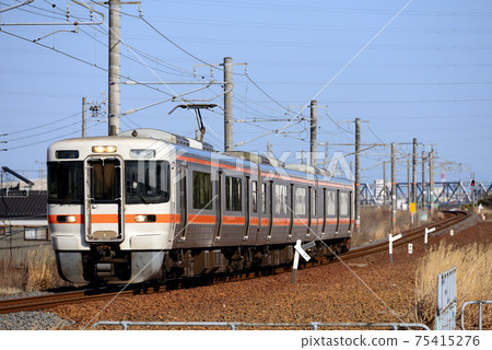 3 series 313 rapid trains going on the Kansai Main Line 3 series 313 rapid trains going on the Kansai Main Line 75415276