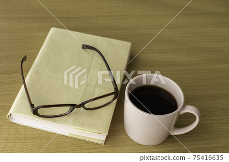 Reading break image. Books, coffee, glasses 75416635