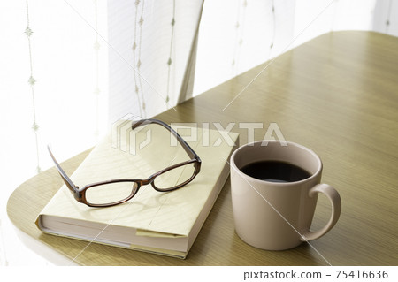 Reading break image. Books, coffee, glasses Reading break image. Books, coffee, glasses 75416636