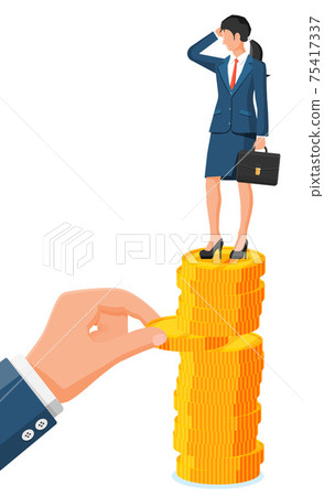Hand tries to pull coin out of coin stack Hand tries to pull coin out of coin stack 75417337