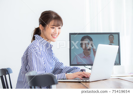 Young woman during telework Young woman during telework 75419654