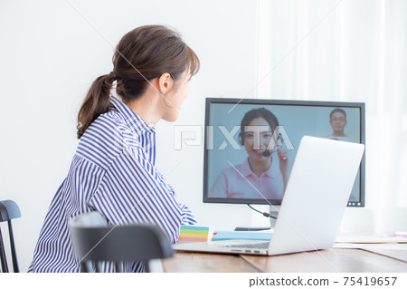 Young woman during telework Young woman during telework 75419657