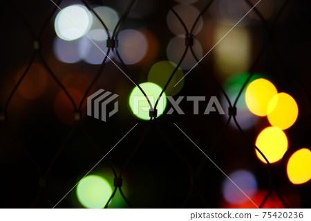 Bokeh and wire mesh Bokeh and wire mesh 75420236
