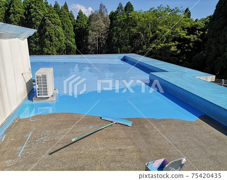 Urethane waterproof spectacle on the roof of a flat roof of a reinforced concrete building Urethane waterproof spectacle on the roof of a flat roof of a reinforced concrete building 75420435