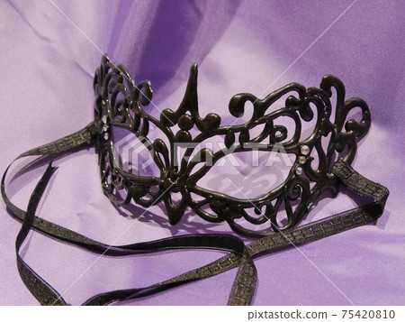 Handmade masquerade mask made with glue gun 75420810