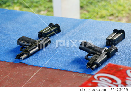Guam live shooting from above Beretta M92 Tosig Sauer P226 Guam live shooting from above Beretta M92 Tosig Sauer P226 75423459