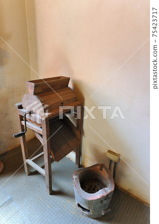 Wooden rice mills from the old age Wooden rice mills from the old age 75423717